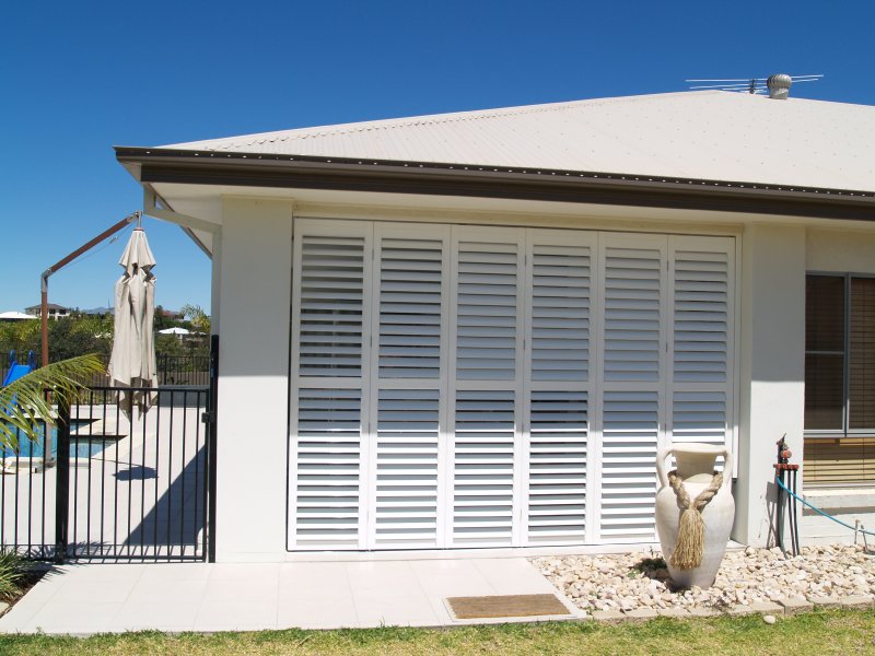 outdoor-room-created-with-aluminium-shutters